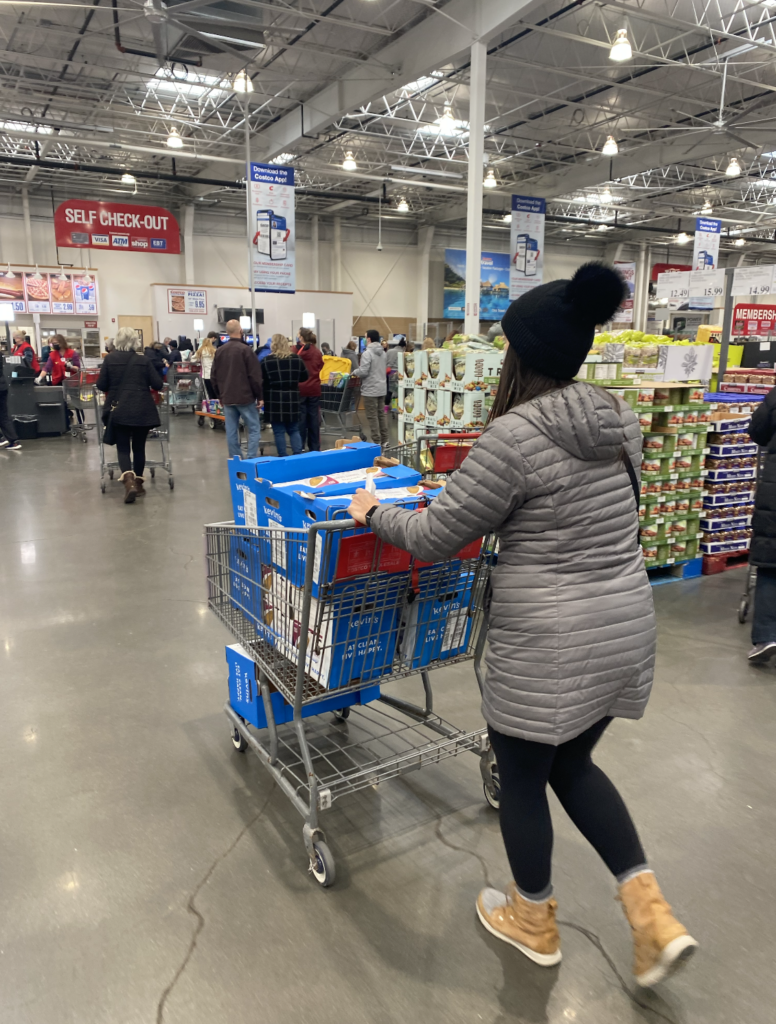 Everlight staff member shops for food and goods at Costco